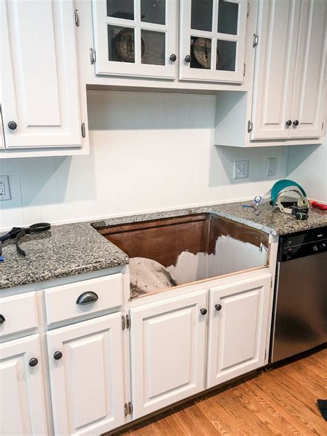 farmhouse sink in existing cabinets